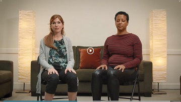Screenshot of video showing women sitting on chairs - click to view video