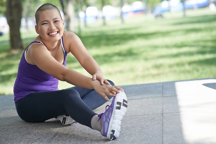 Woman stretching her leg