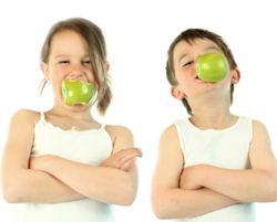 Children eating apples