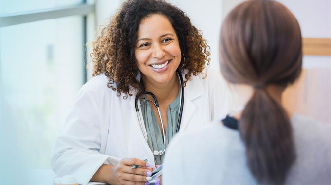 Provider and patient in medical office 