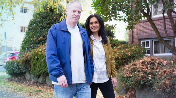 Couple walking in neighbourhood