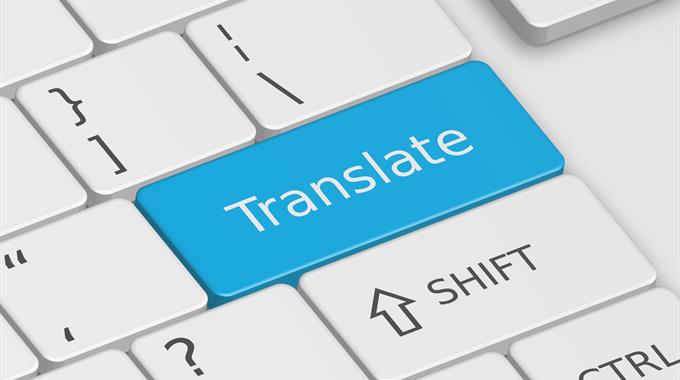Computer keyboard with a "Translate" key highlighted in teal