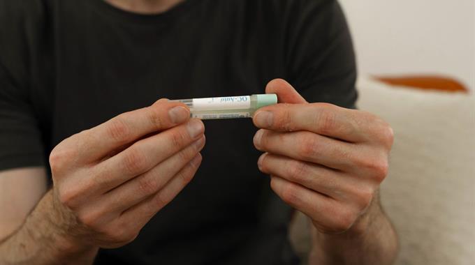 Close-up of person holding a FIT 
